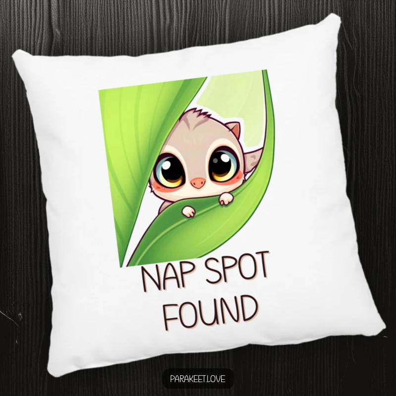 Funny pillow featuring a cute, fluffy winged creature with big, curious eyes peeking from behind a green leaf. Soft and humorous decor.